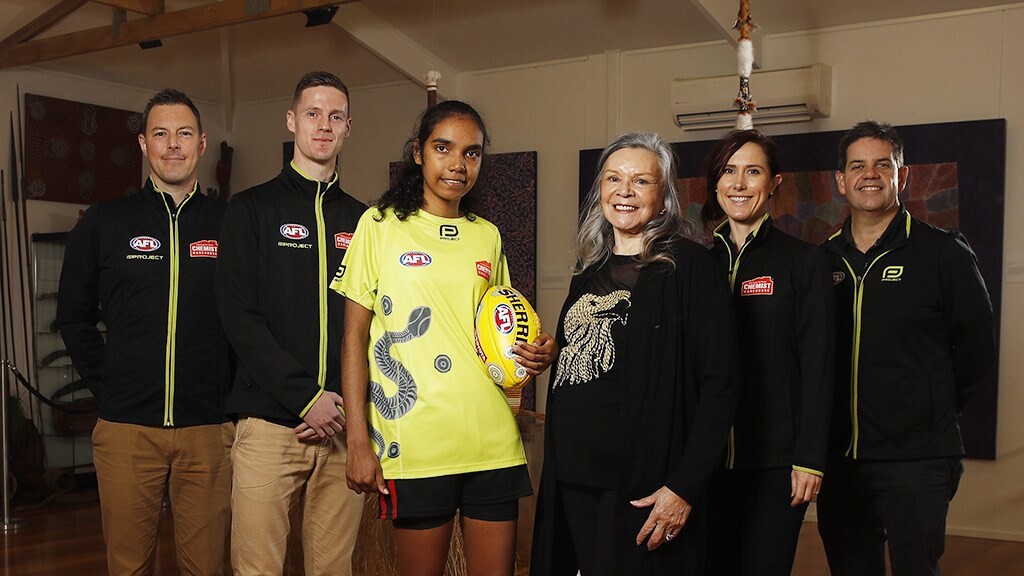 umpSHAA200519DB0017.jpg Student Rose Archie wearing the umpires' shirt for the Sir Doug Nicholls Round - AFL,Indigenous,Tag-AFL HQ